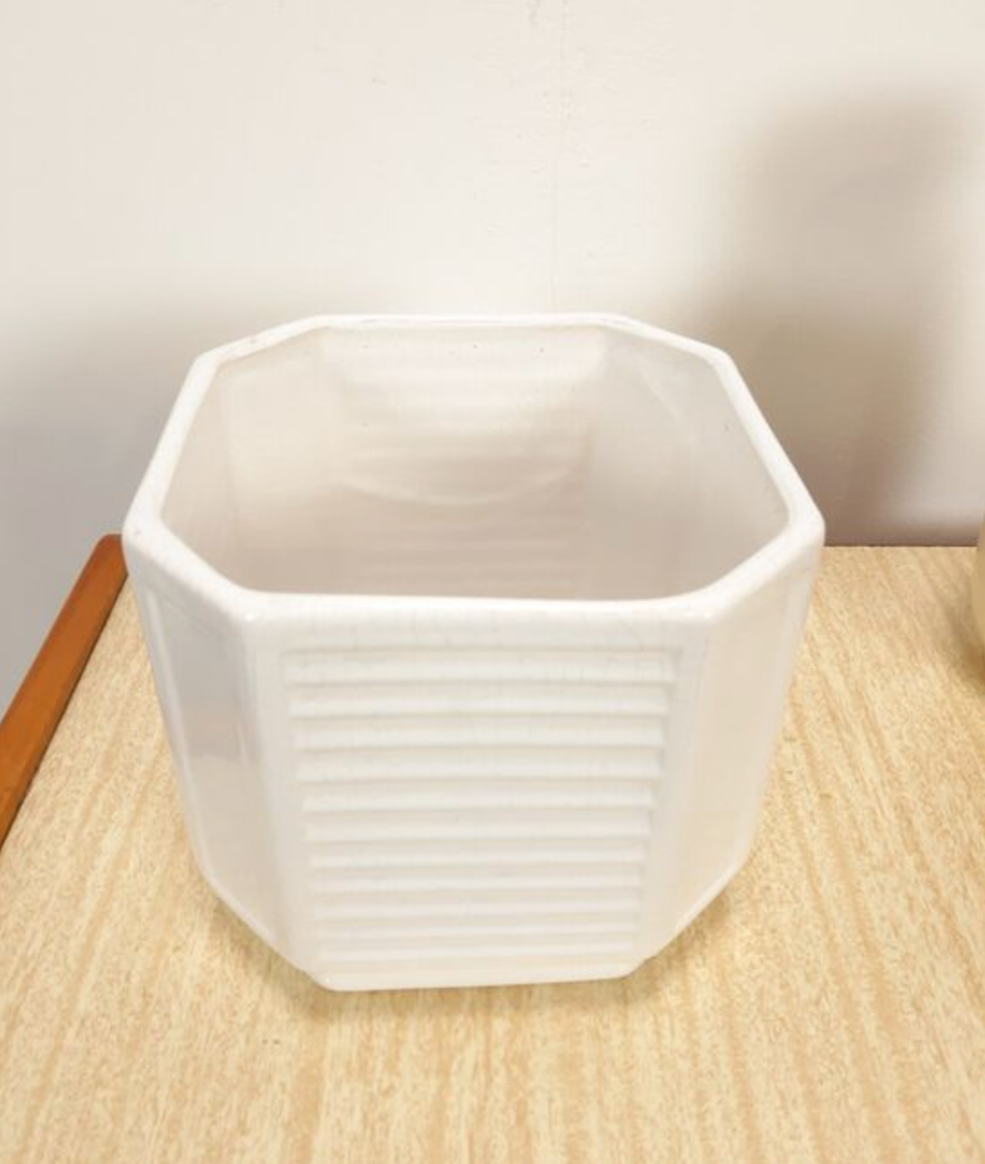 White vintage pot cover with stripes