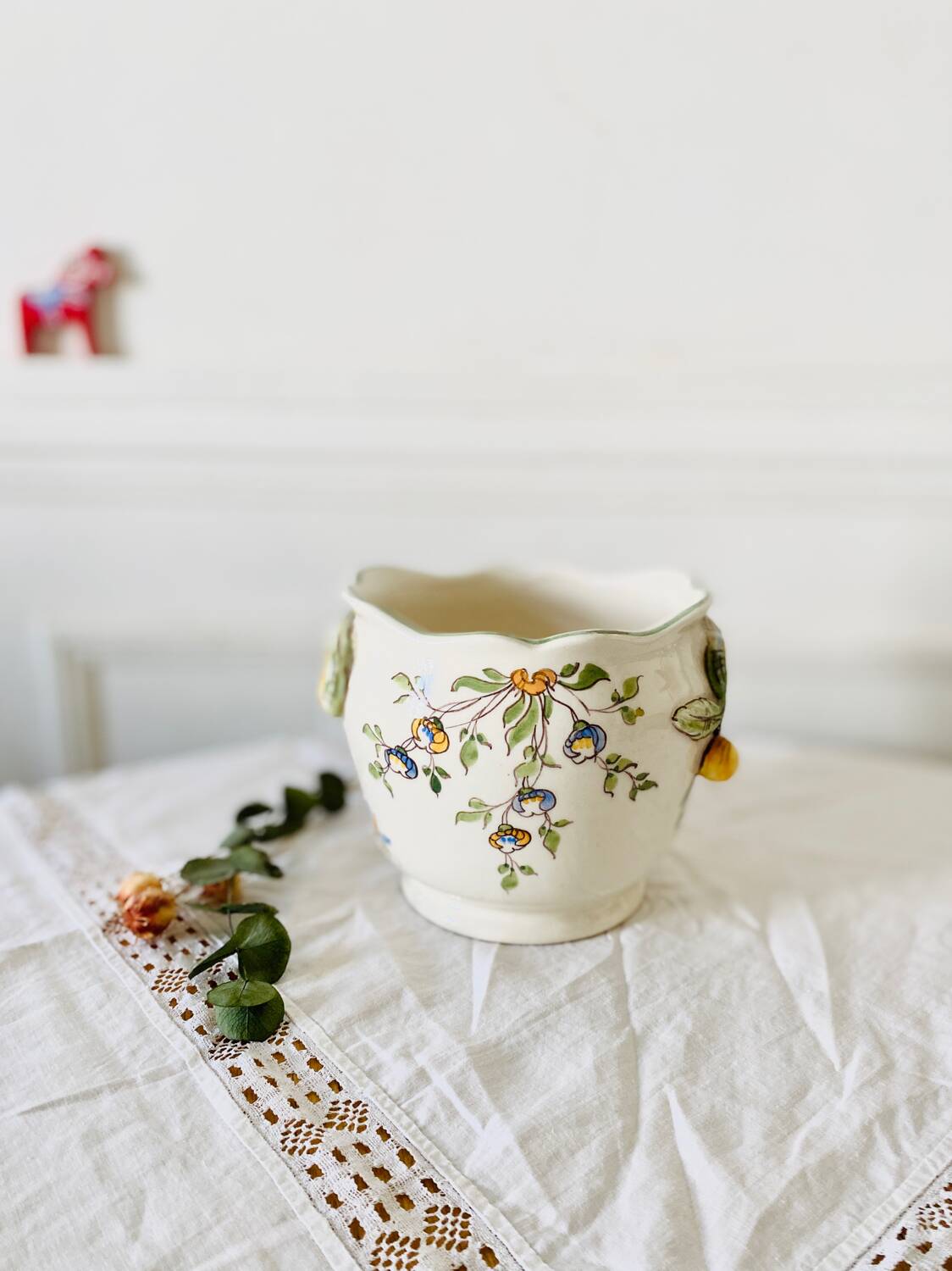 Old earthenware pot cover from Moustiers, hand decorated