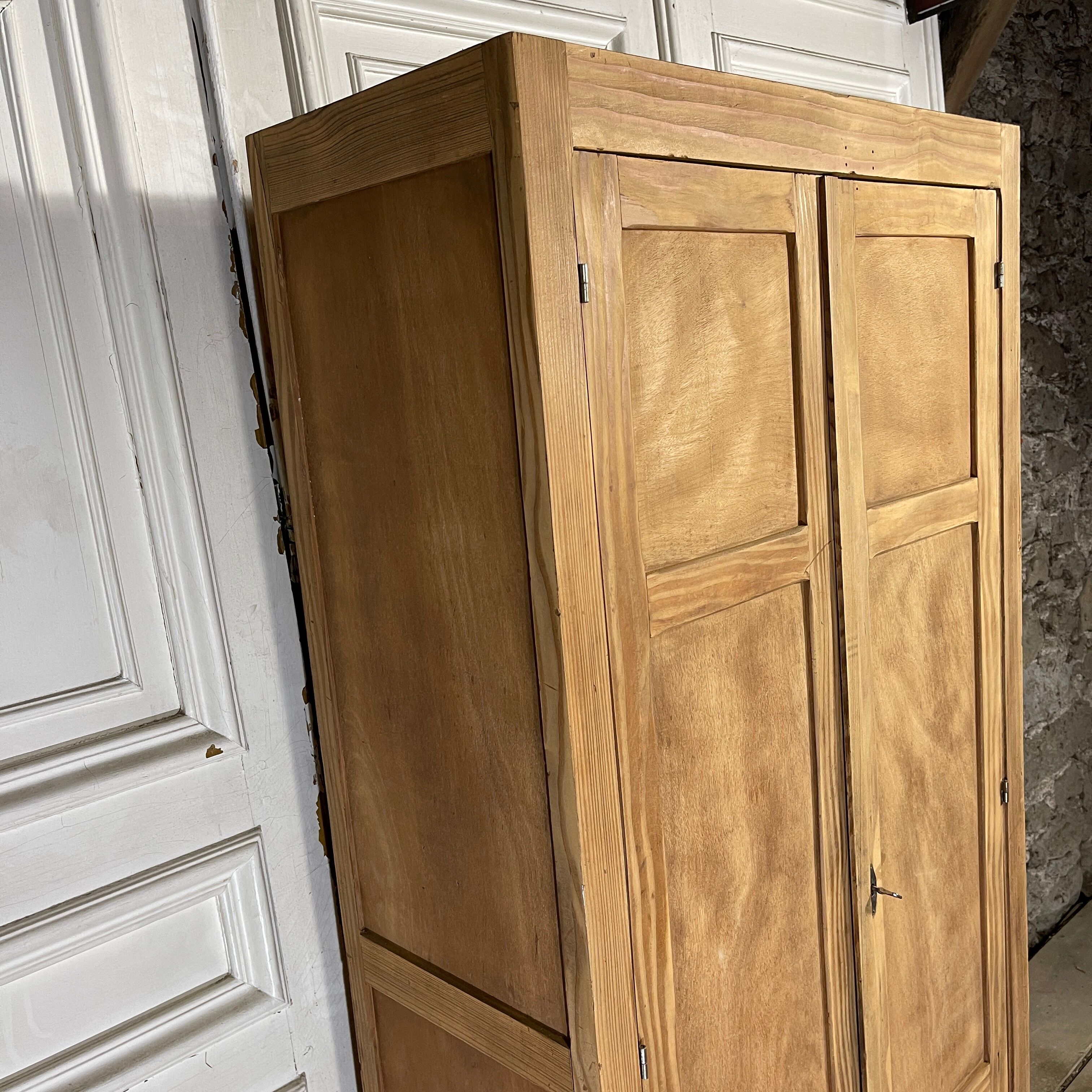 Parisian wardrobe in raw wood