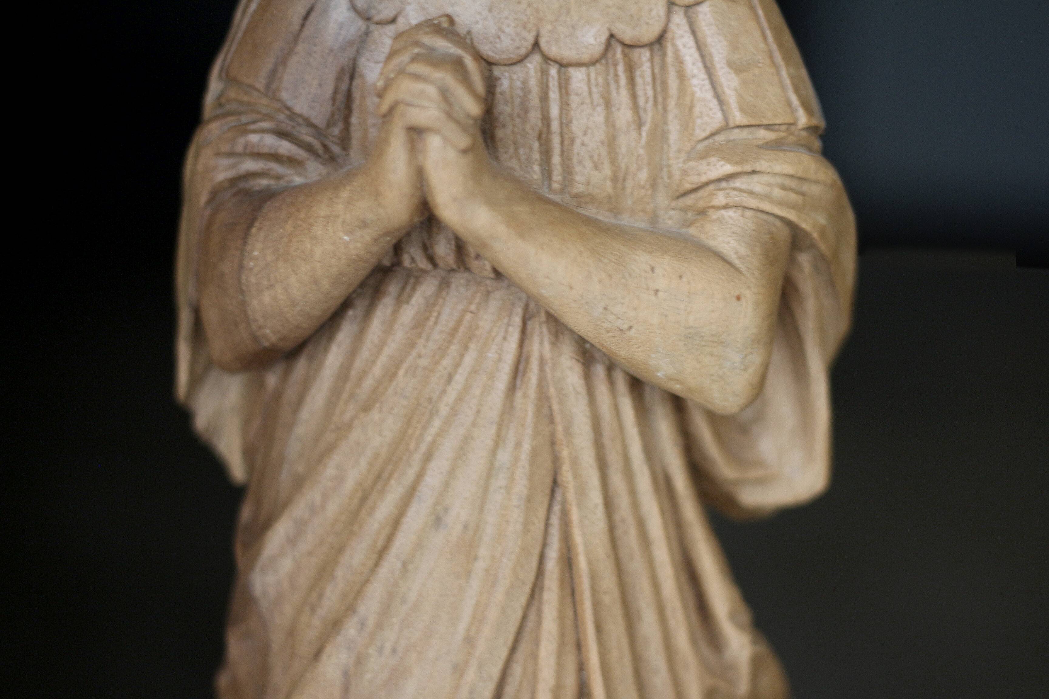 Sacred art: 19th century beechwood cherub statuette