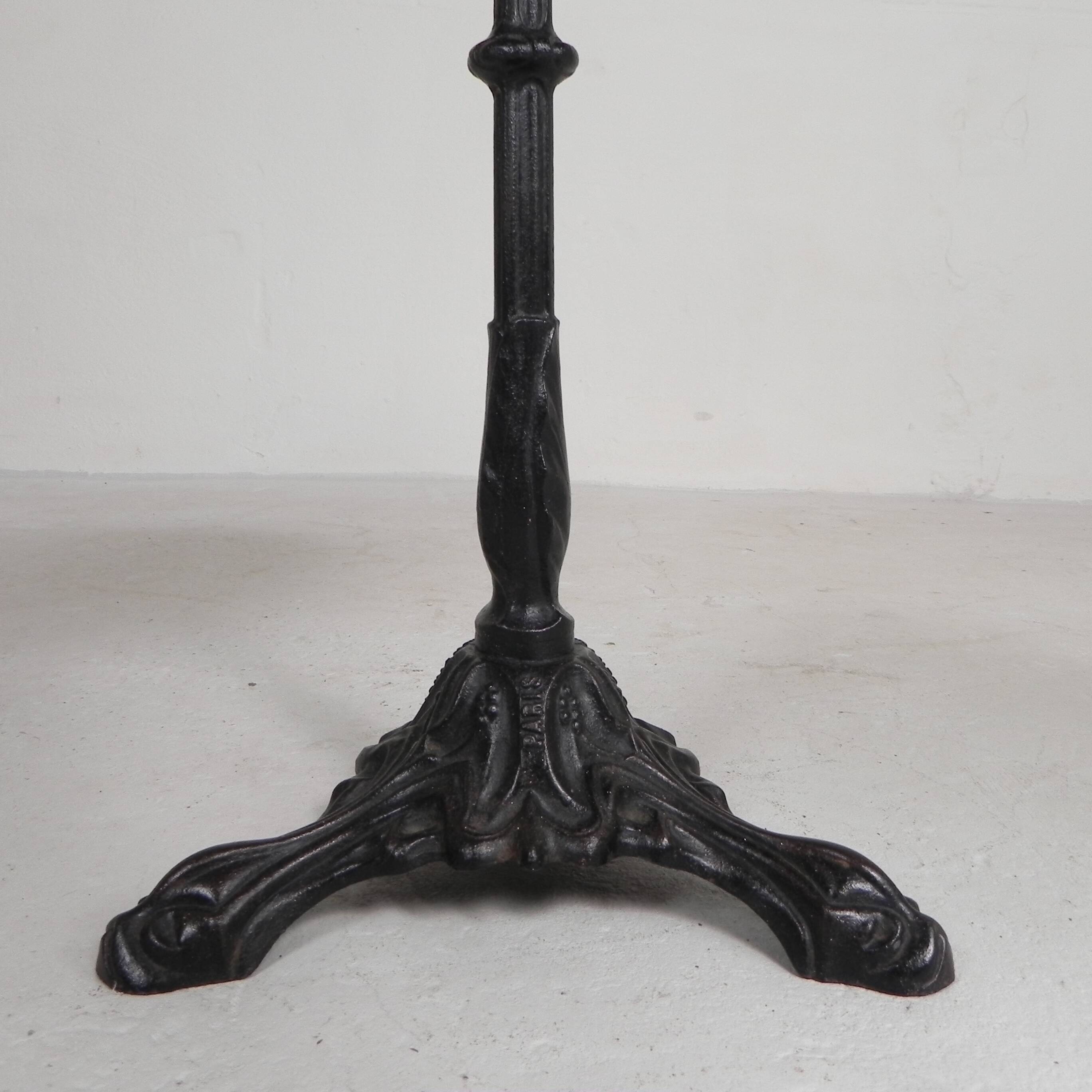 Bistro table with a cast iron base and a traffic sign as a tabletop, Paris 1920s.