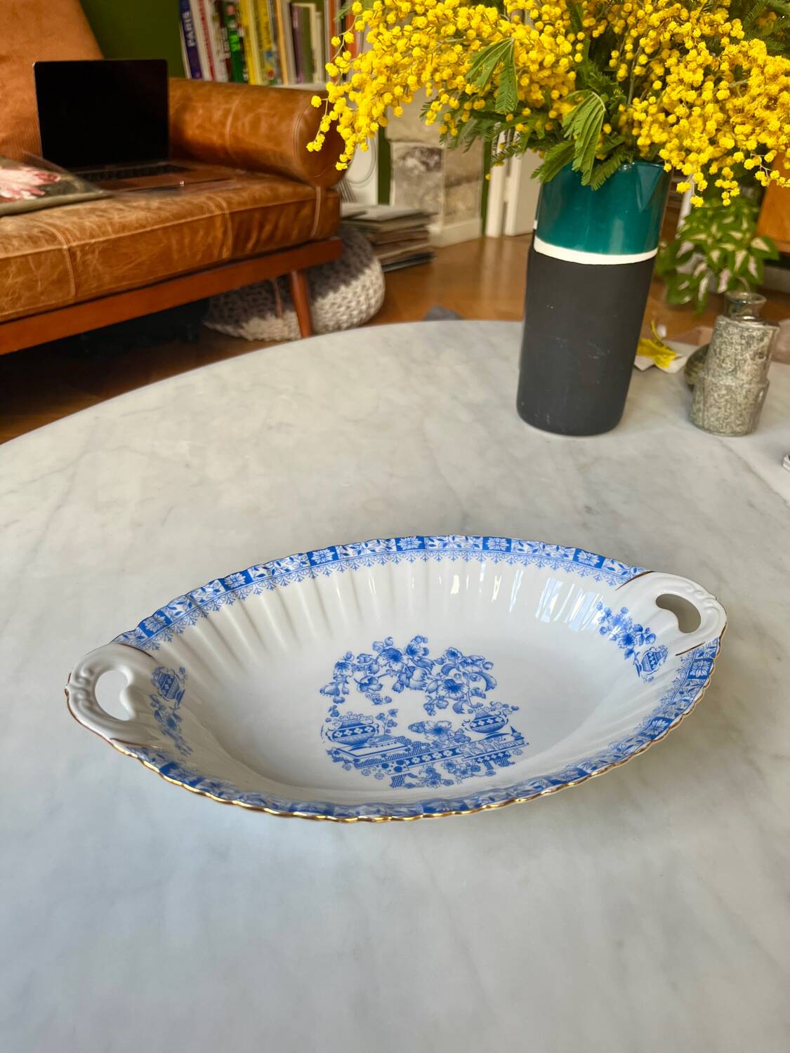 Antique oval dish with handles in earthenware