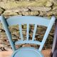 Set of four mismatched bistro chairs