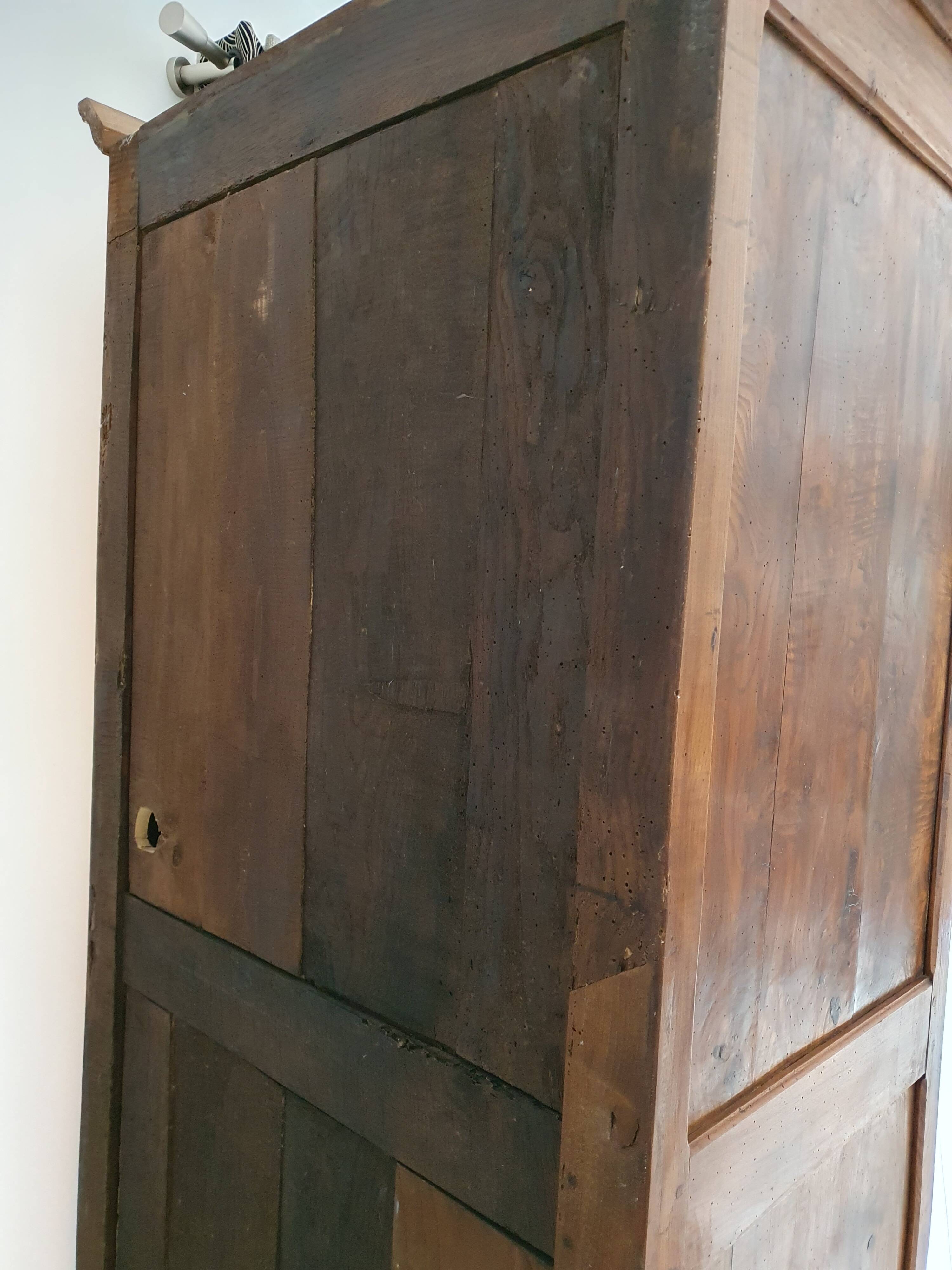 Standing man, solid oak wardrobe