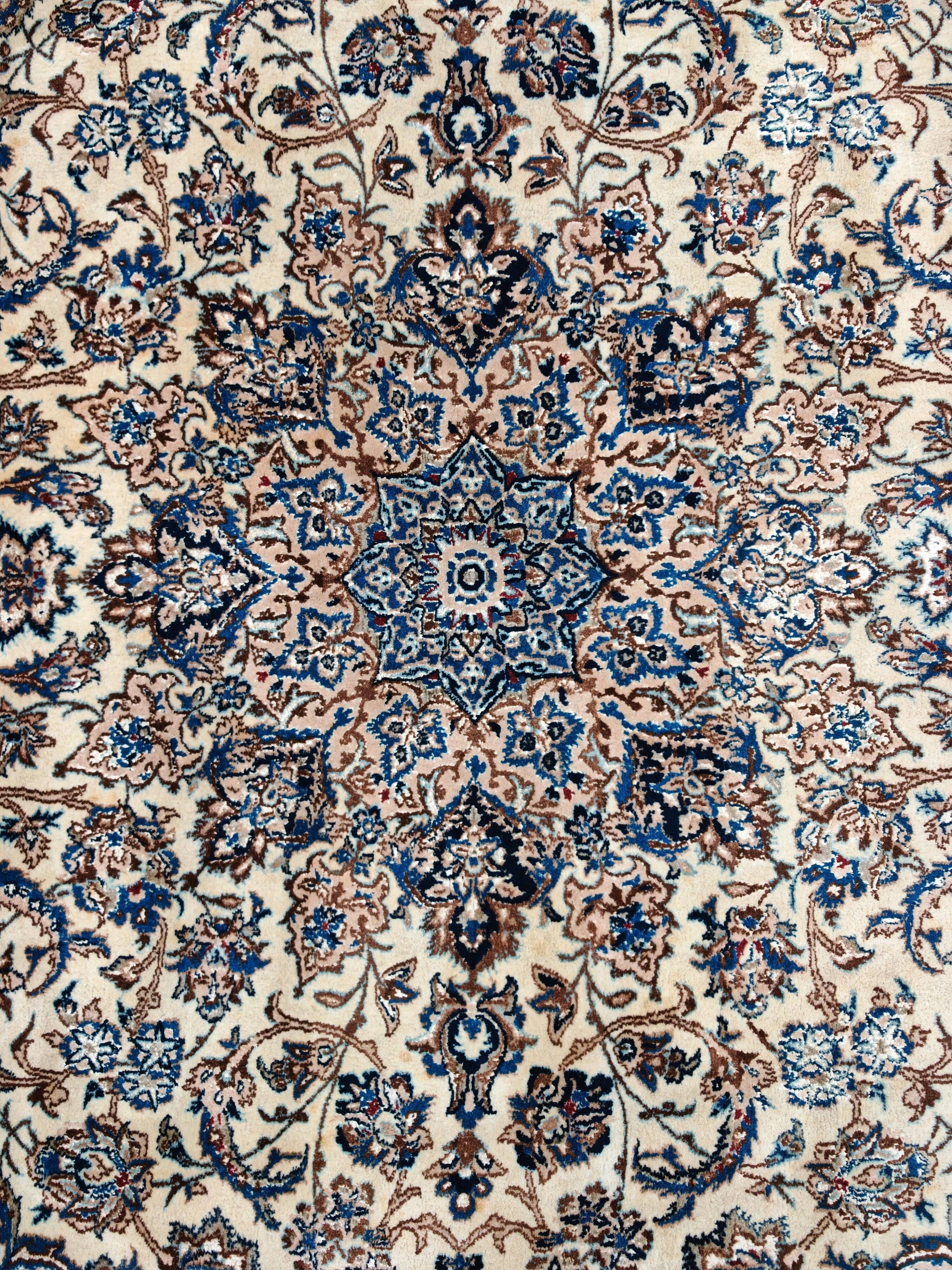 Vintage Persian Nain carpet, handwoven wool and silk from the 1940s.