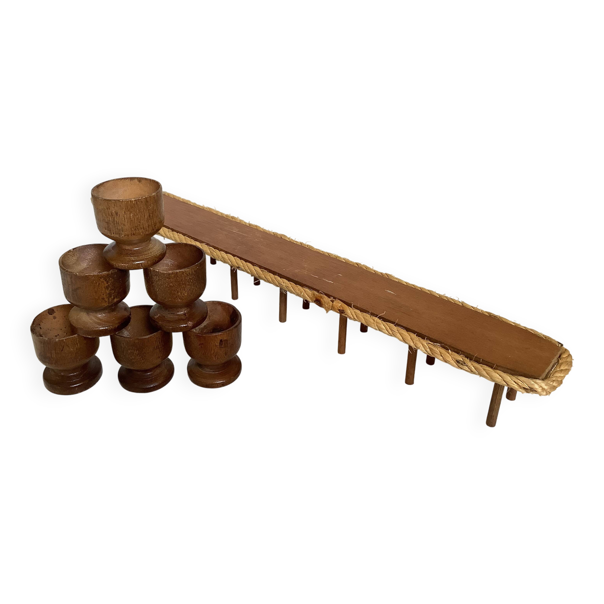 Six wooden egg cups and their rope holder