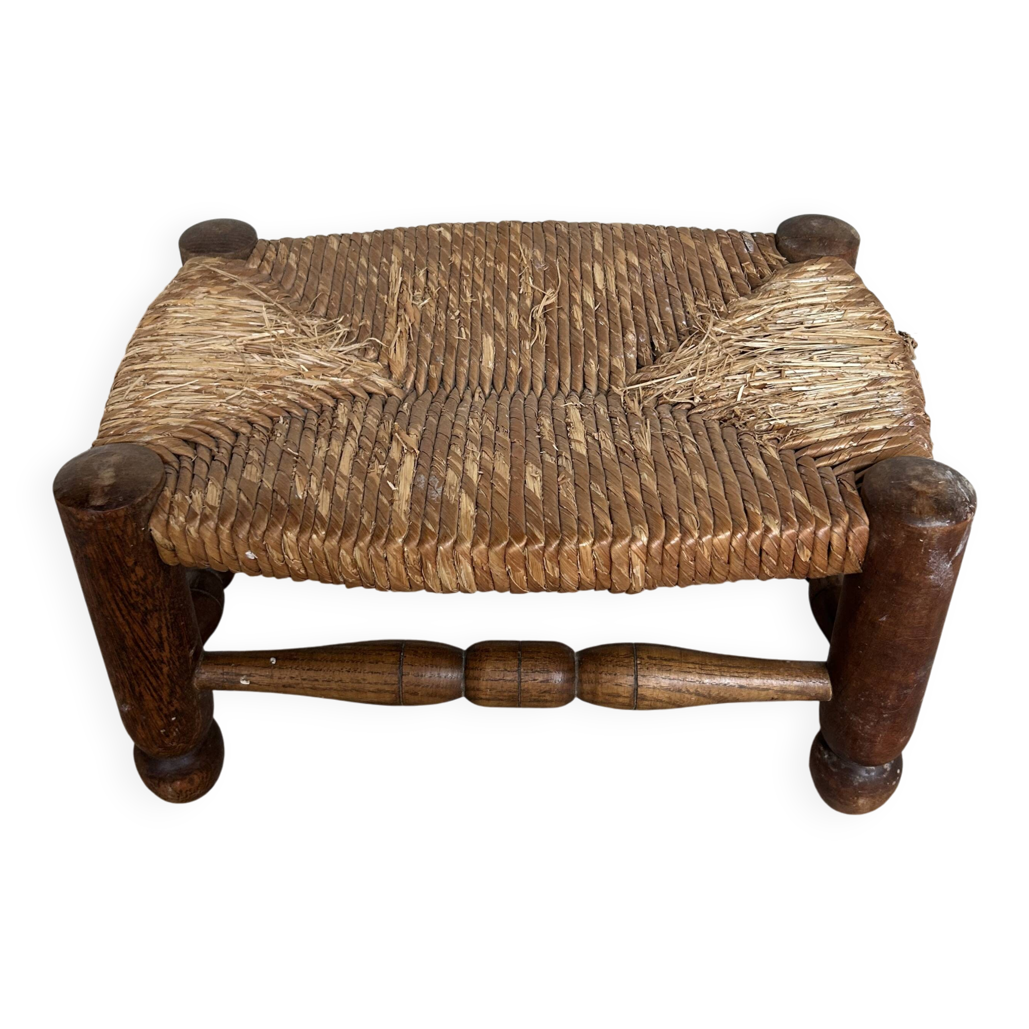 Rustic footrest made of wood and straw