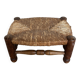 Rustic footrest made of wood and straw