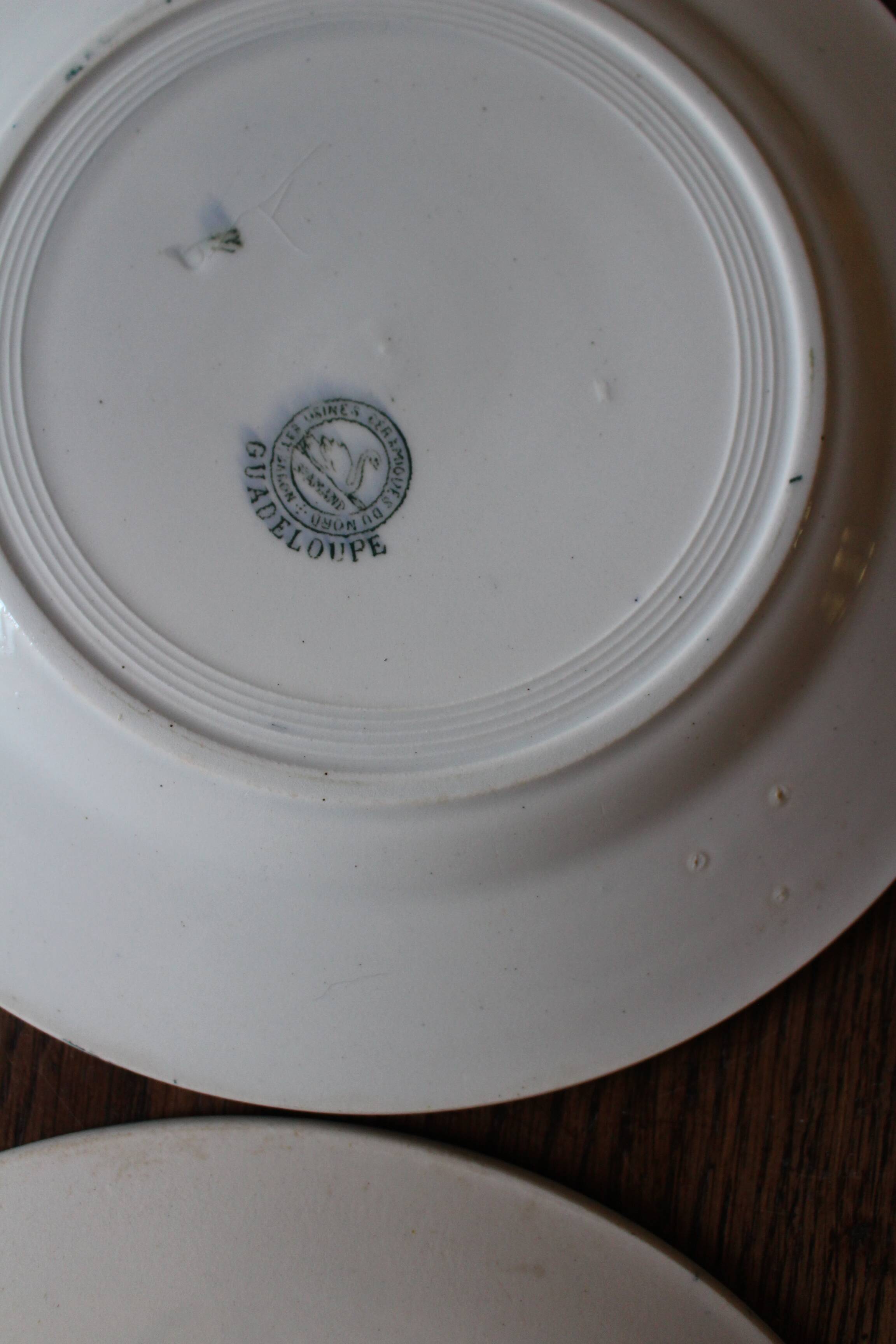 Set of 4 mismatched blue flat plates