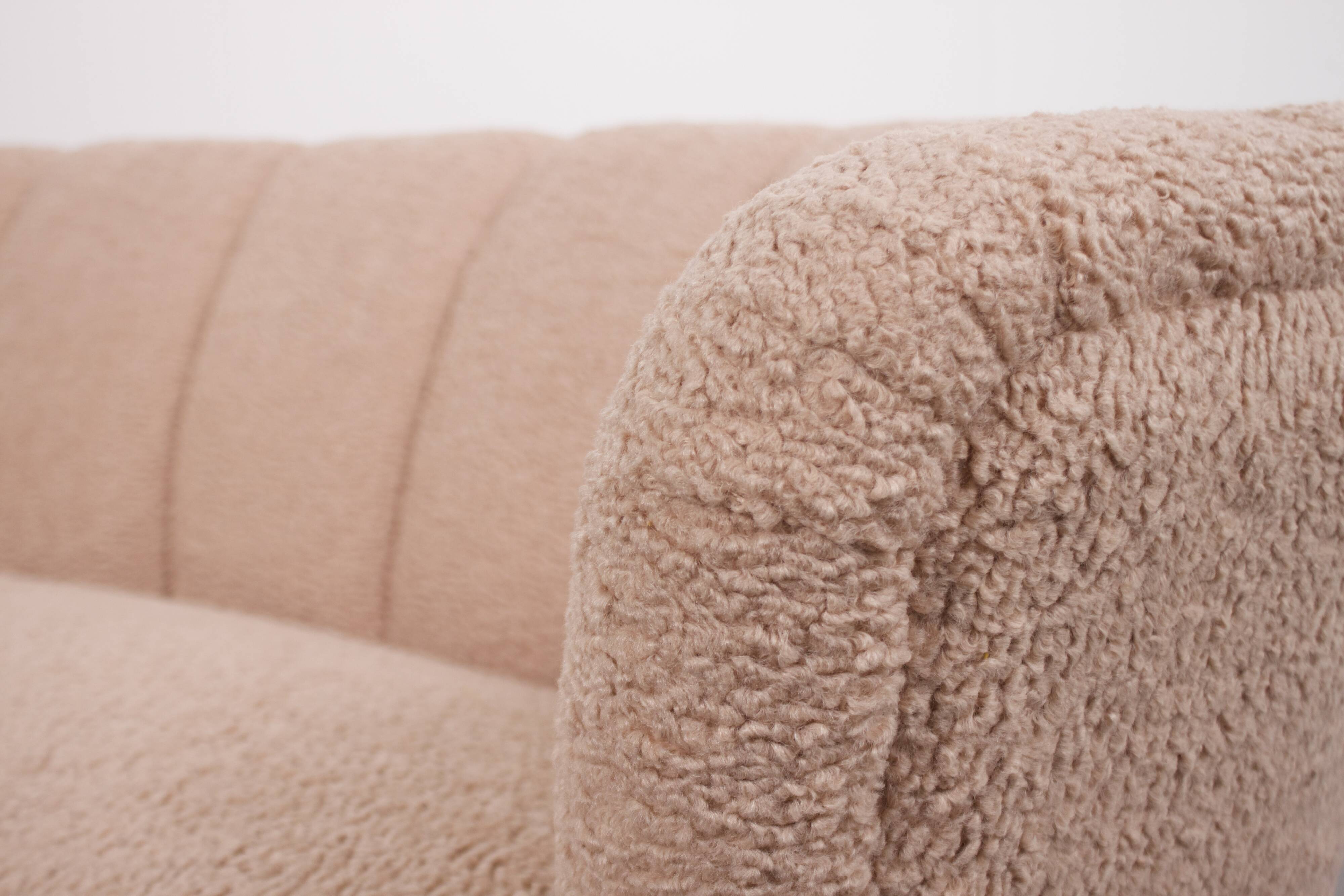 Danish curved banana sofa in a powder pink wool fabric, 1940s