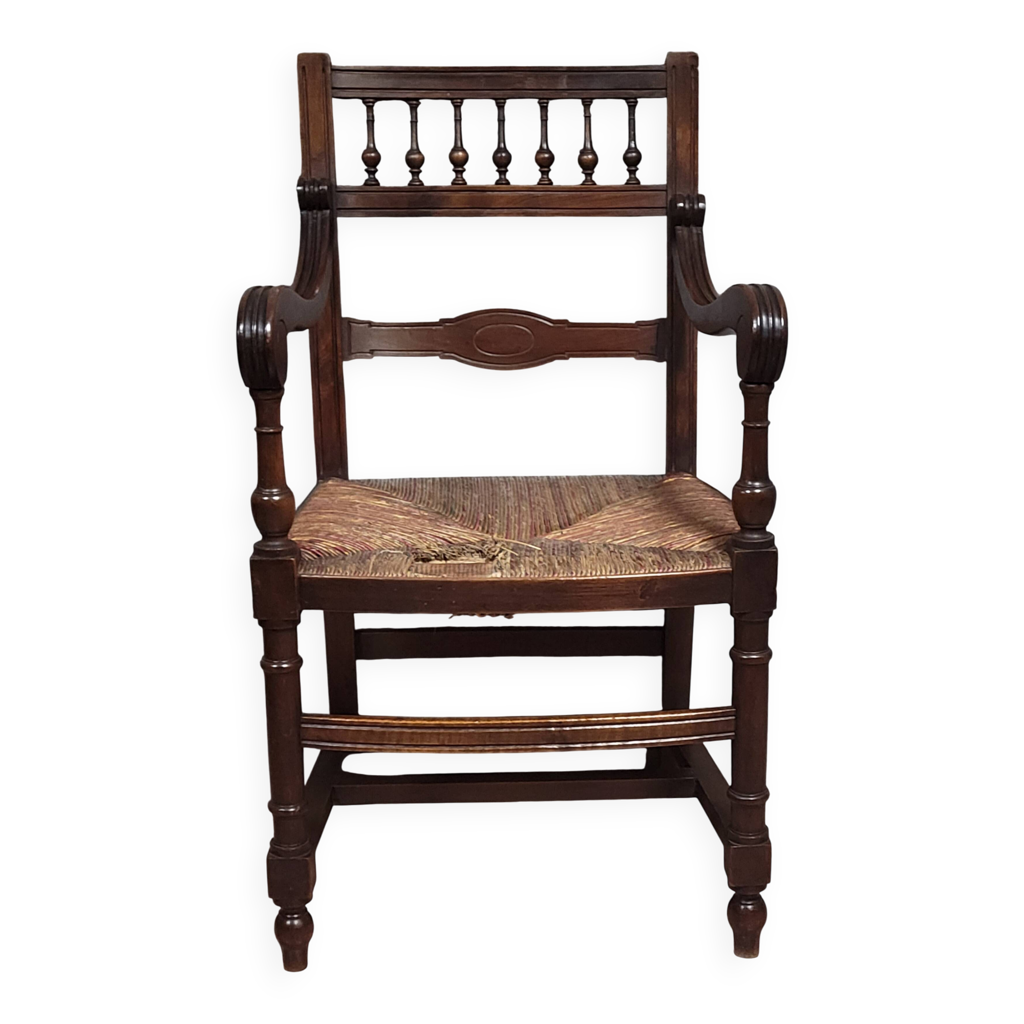 Renaissance-style armchair in solid wood, featuring a columned back