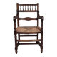Renaissance-style armchair in solid wood, featuring a columned back