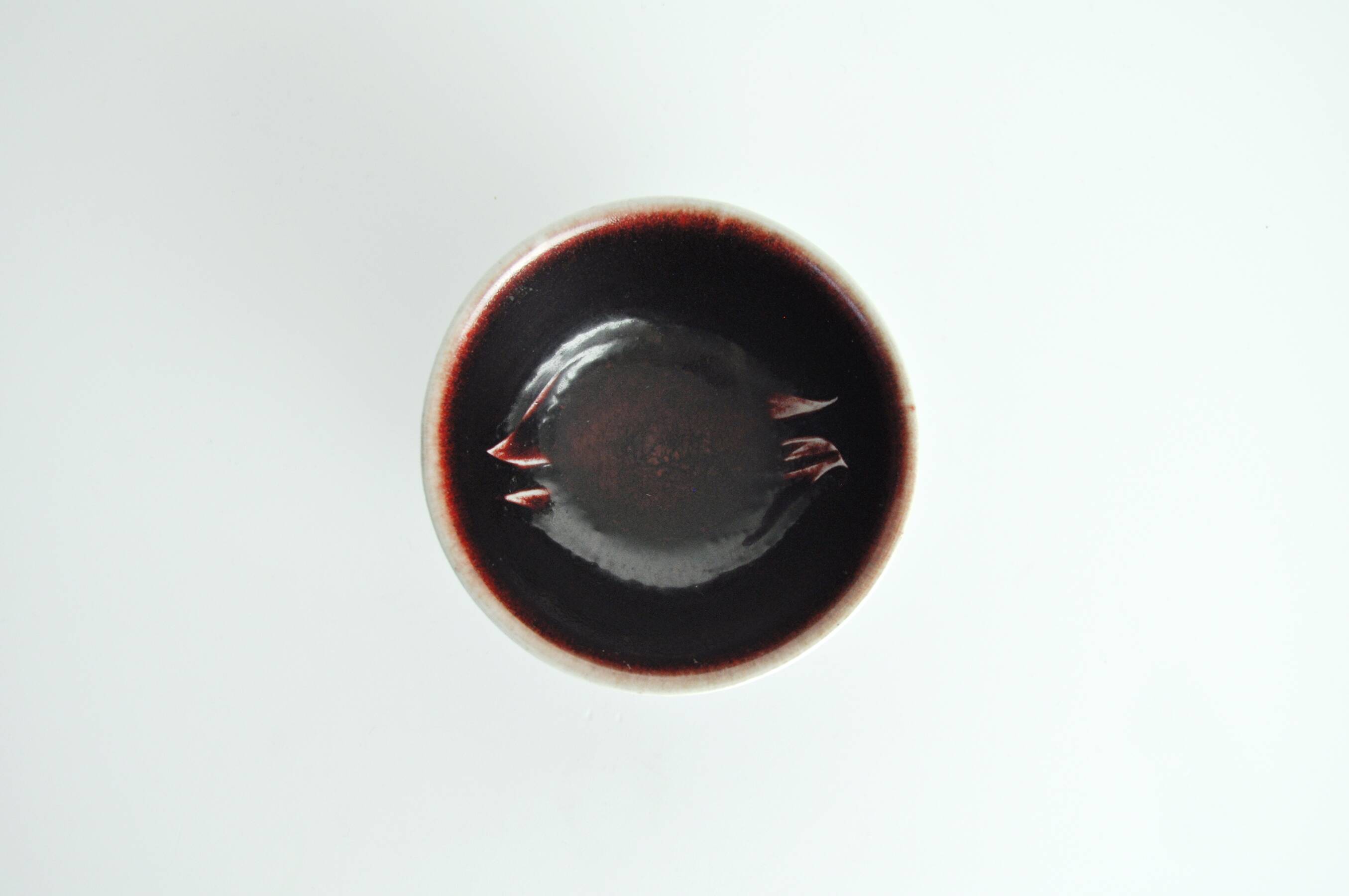 Bowl with oxblood glaze by Gerd Bøgelund for Royal Copenhagen, Denmark