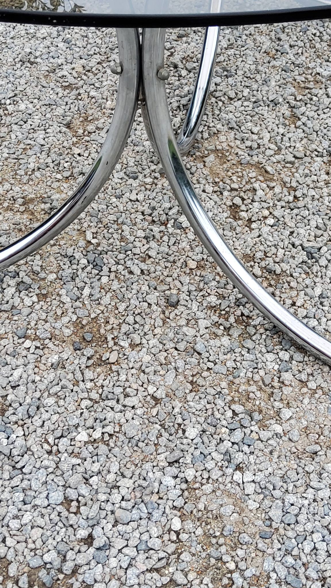 Dining table from the 70s top smoked glass base chrome
