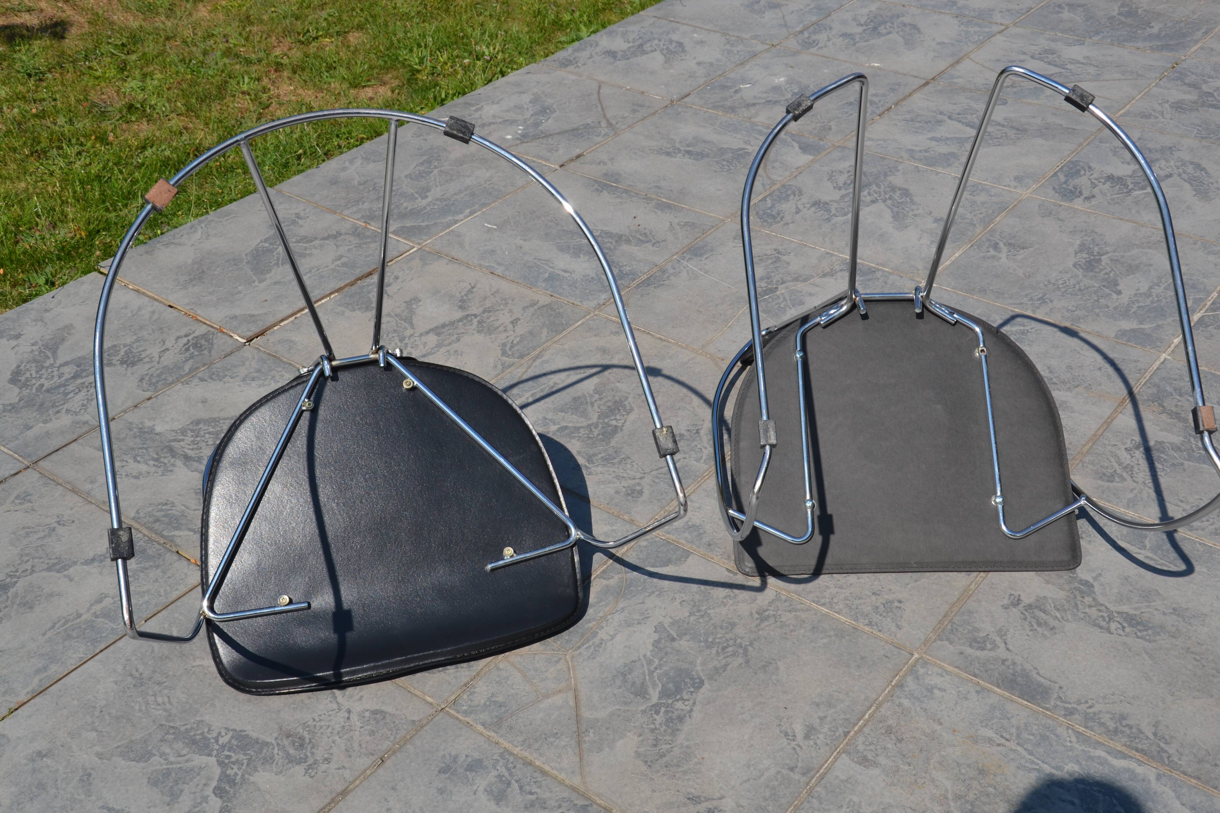 4 chrome and leather chairs designed by Italy