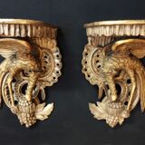Pair of polychromed wooden wall mounts