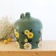 Cruche ancienne en terre cuite peinte en vert