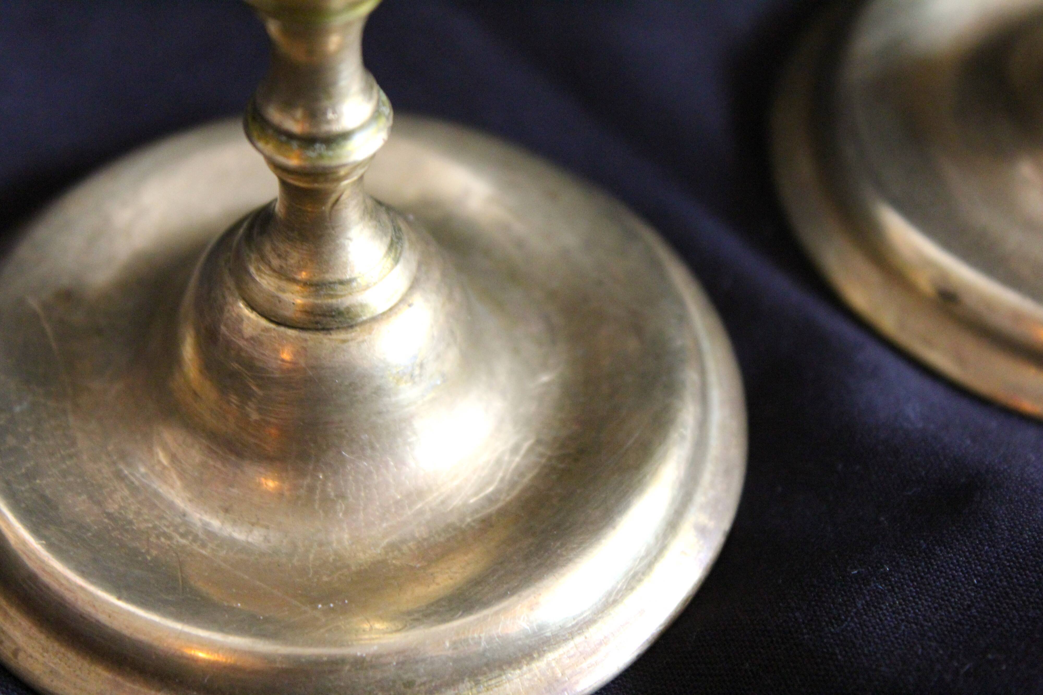 Pair of brass candle holders