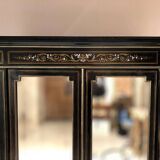 Napoleon III bookcase, blackened wood inlaid with brass, ivory and mother-of-pearl