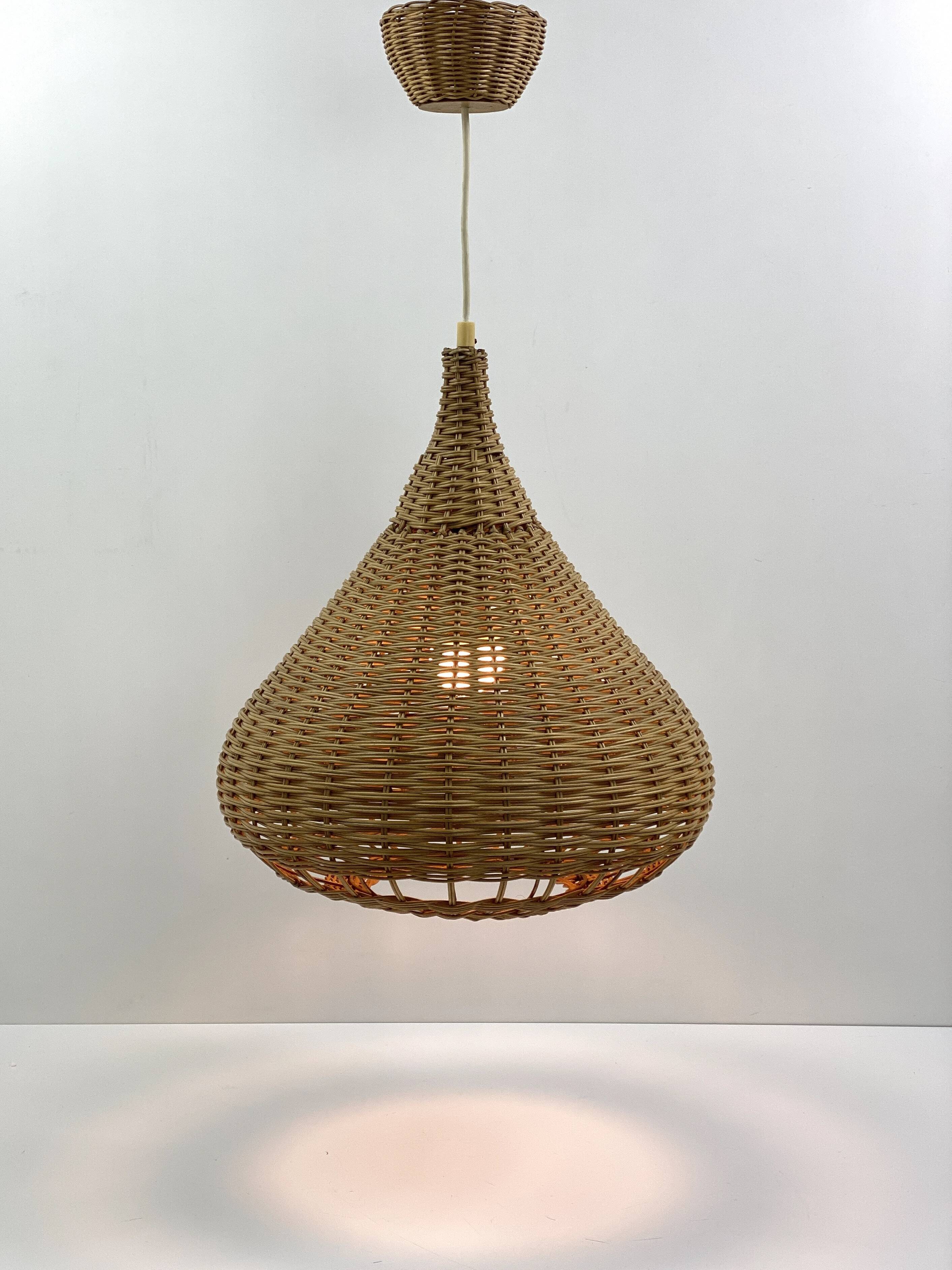Vintage wicker pendant light from the 1960s.