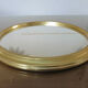Round mirror top in gilded aluminum art deco