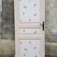 Porte ancienne en bois patine beige