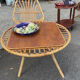 "Trampoline" round coffee table in 1960s rattan