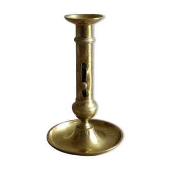 Candlestick in gilt bronze