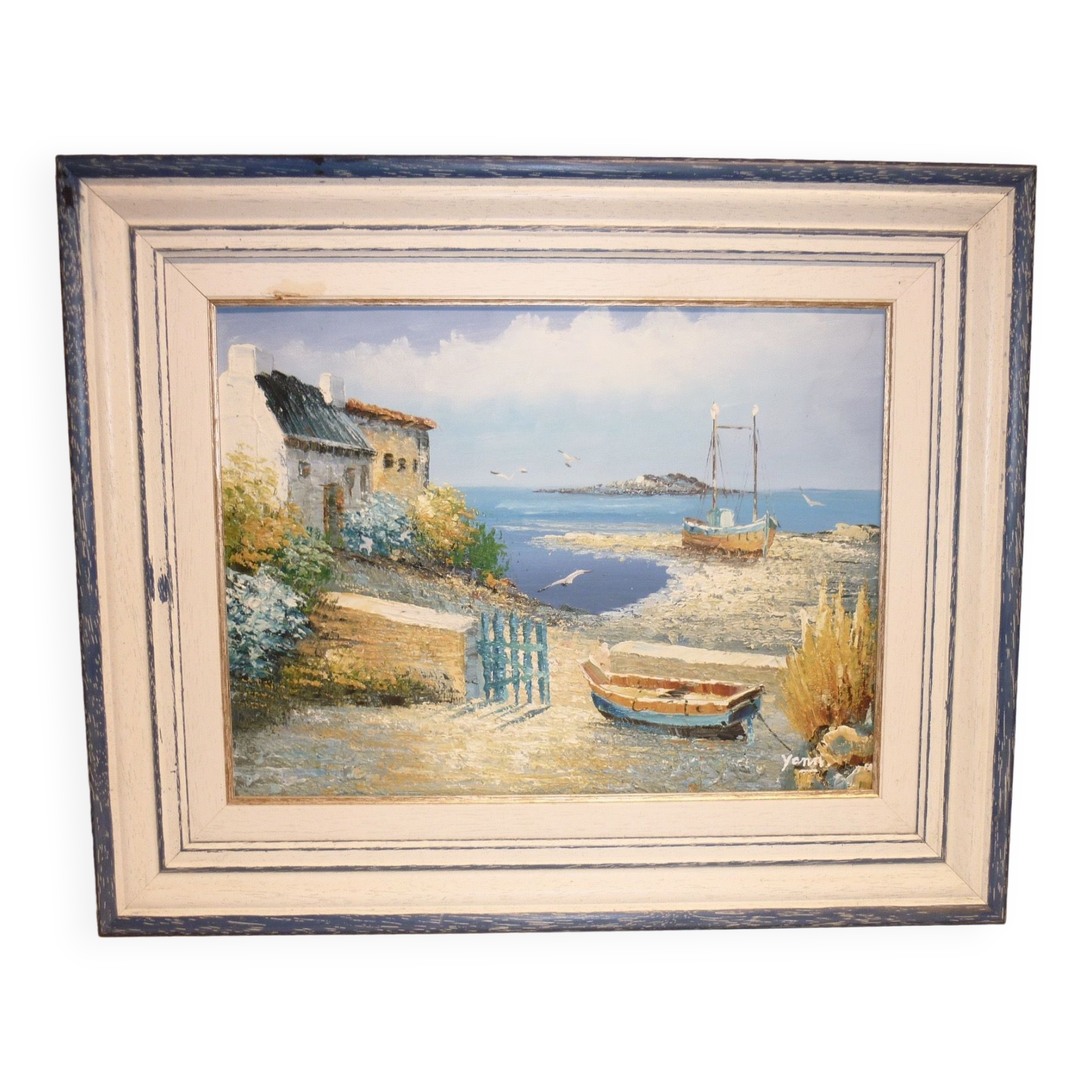 Oil on canvas of a boat on the foreshore signed Yann 55X45