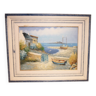 Oil on canvas of a boat on the foreshore signed Yann 55X45