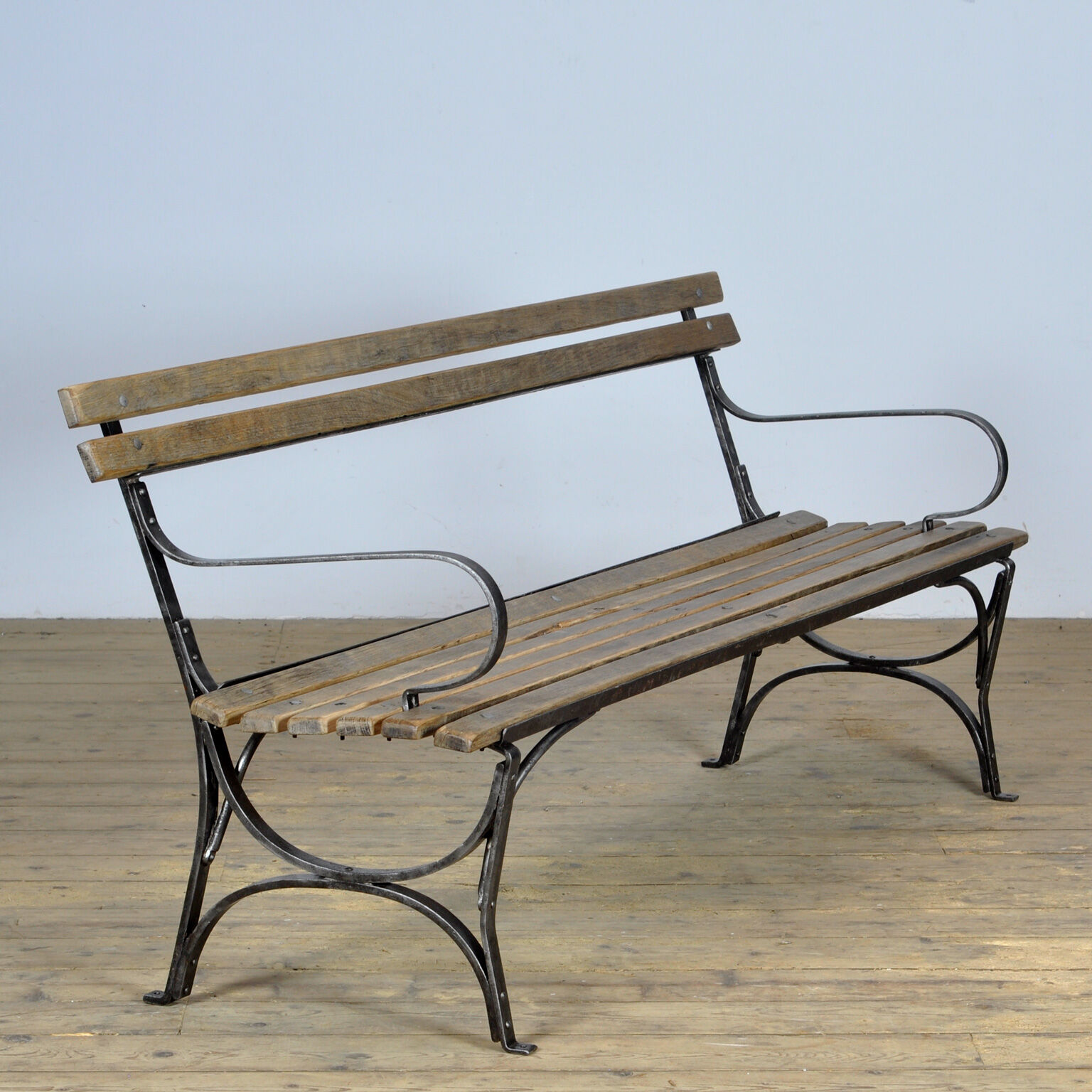 Riveted iron park bench 1920s