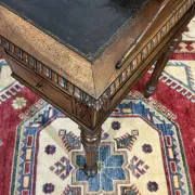 Louis XVI style desk from the late 19th century in walnut with a leather top.