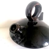 Chevrette modernist in black enamelled sandstone, circa 1970