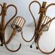 Rattan wall lights by Louis Sognot