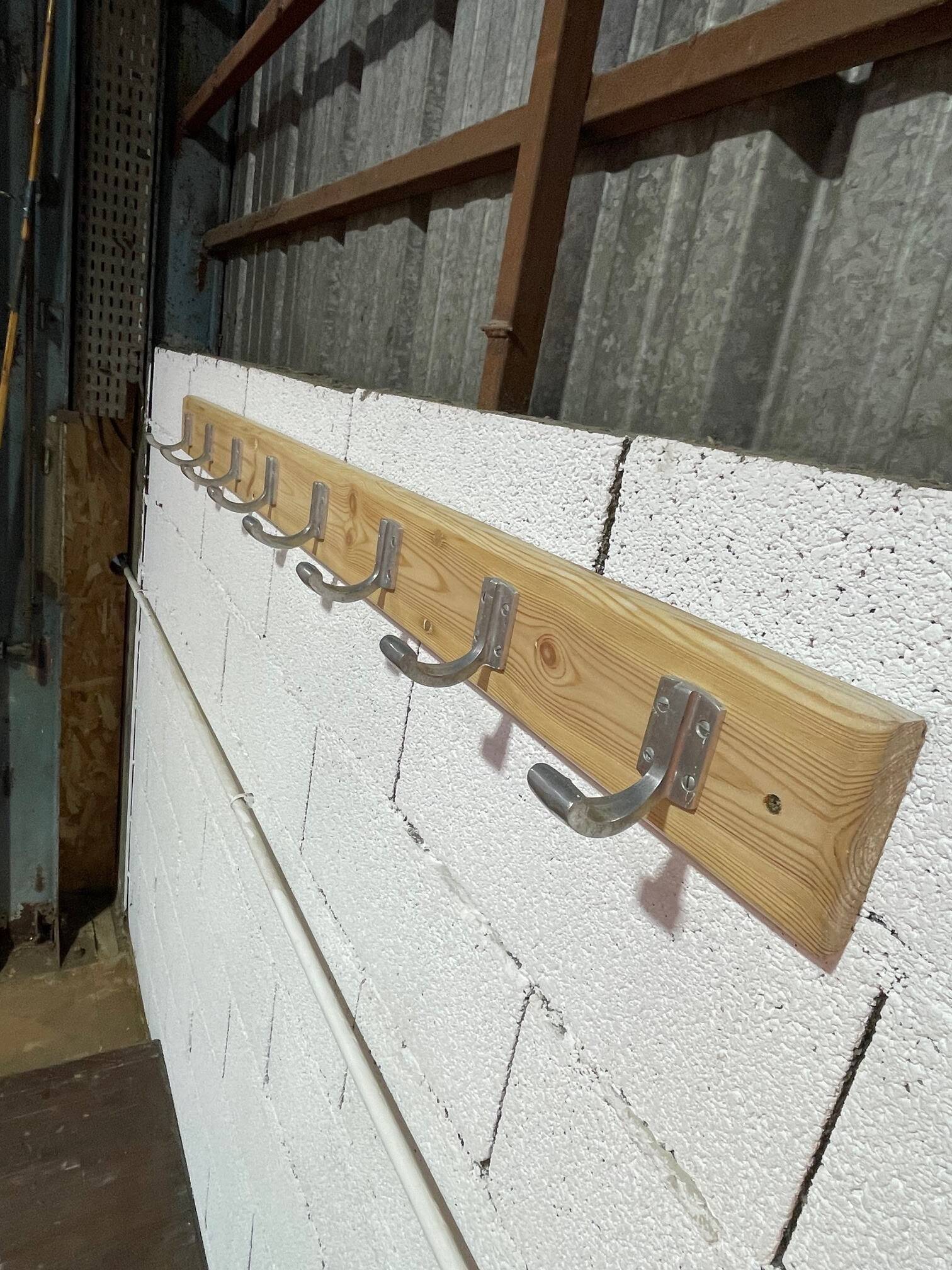 Vintage wall coat rack from the 1960s.