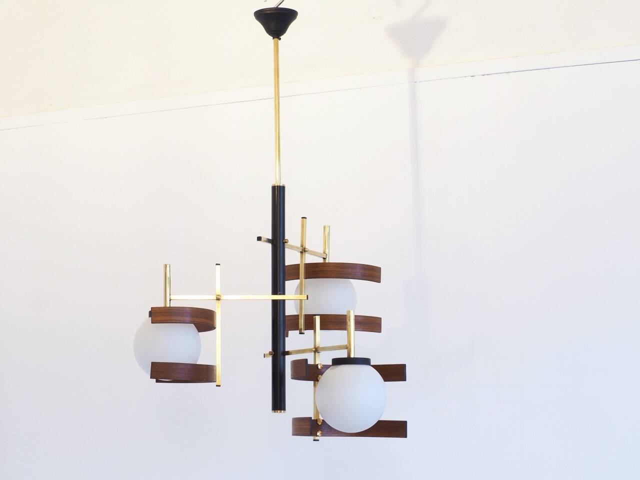 Italian 3-globe pendant light in opaline with teak and brass.