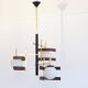 Italian 3-globe pendant light in opaline with teak and brass.