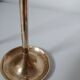 Set of two straight brass candlesticks.