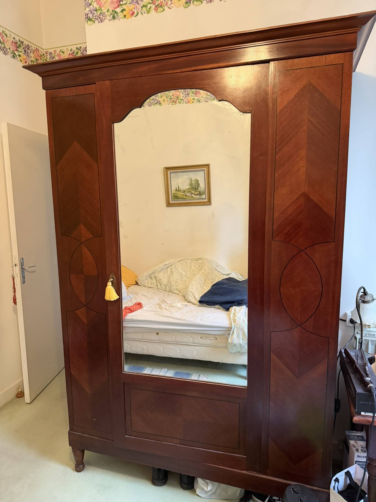 Mahogany inlaid wardrobe with a mirror