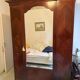 Mahogany inlaid wardrobe with a mirror
