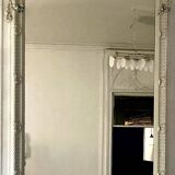 Louis XVI style mirror in wood and carved stucco 20th century