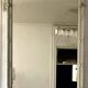 Louis XVI style mirror in wood and carved stucco 20th century