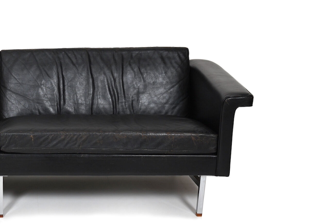 Danish leather sofa with chrome legs and teak ends