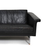 Danish leather sofa with chrome legs and teak ends