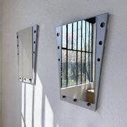 Pair of "Memphis" mirrors from the 80s in chrome and wood.
