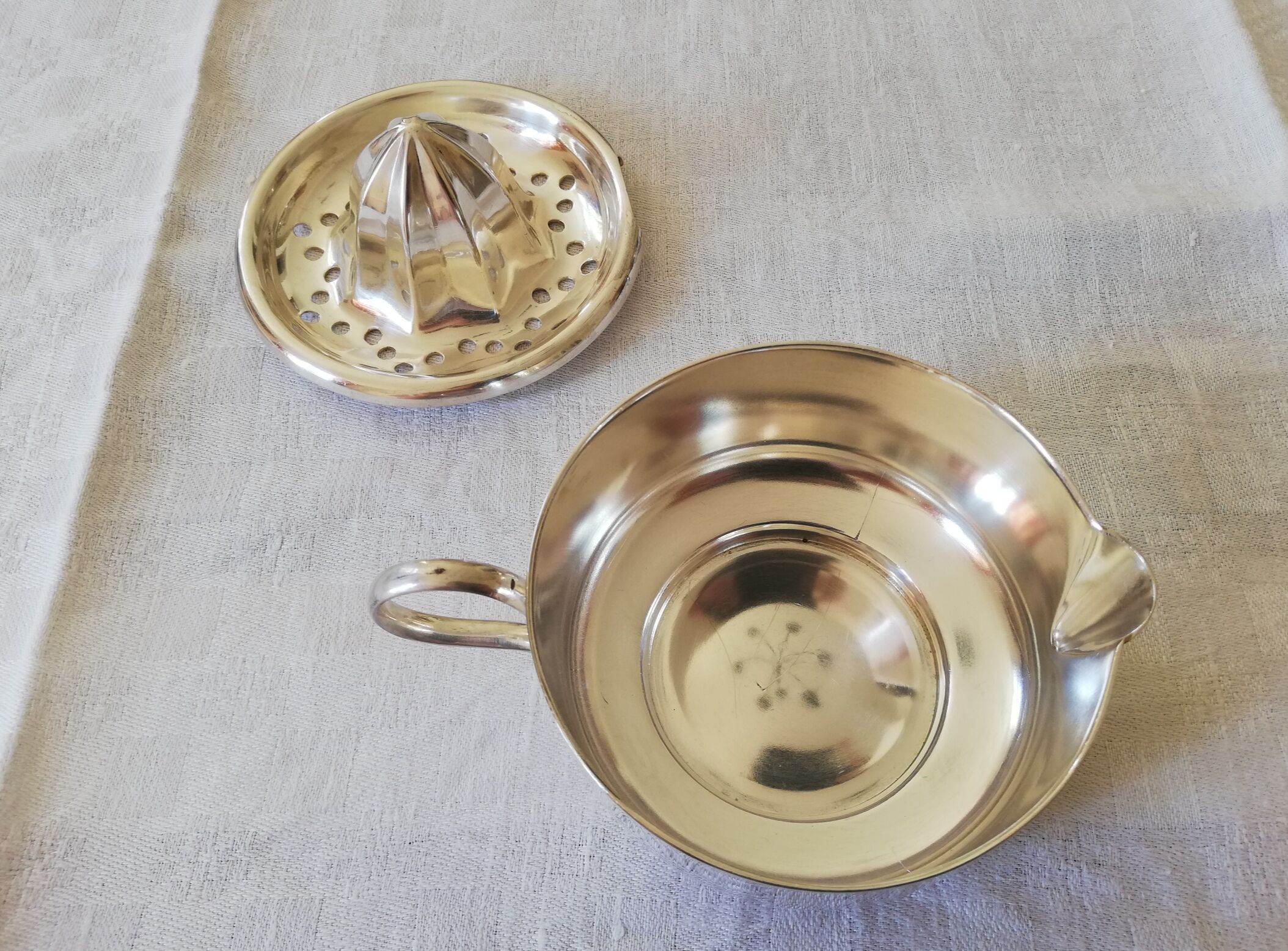 Silver metal citrus press Christofle