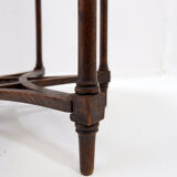 Hexagonal pedestal table or side table with a lattice structure and star pattern.