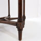 Hexagonal pedestal table or side table with a lattice structure and star pattern.