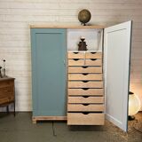 Wardrobe with two wardrobe compartments and drawers