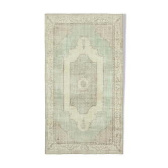 Handwoven vintage anatolian beige rug 170 cm x 307 cm